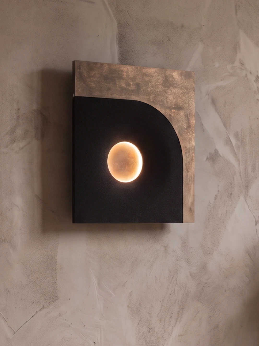 Strata Wall Light, black quartz sand + metal or wood surface, by Rollo Studio, view 2